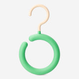 Round scarf and belt hook from Flying Tiger Copenhagen, mounted on a wall for home organization.