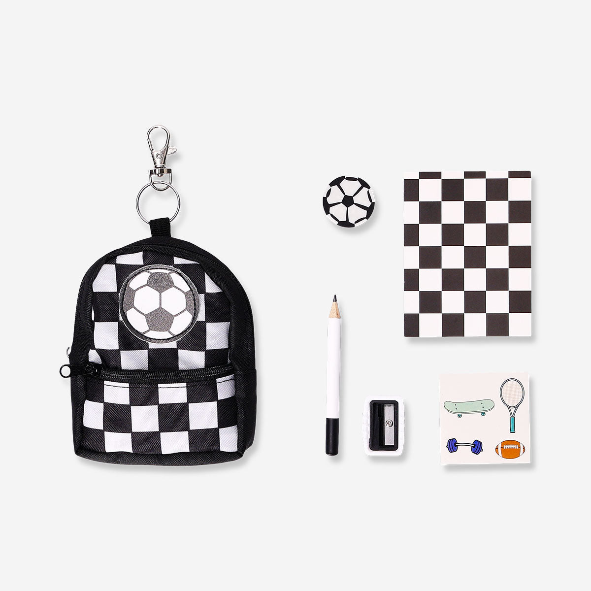 Mini soccer-themed stationery kit in a Flying Tiger Copenhagen backpack, featuring pens, notebooks, and office supplies.