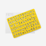 Wooden drawing stencil with alphabet letters and numbers for arts and crafts by Flying Tiger Copenhagen.