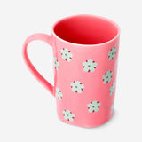 Pink floral ceramic mug from Flying Tiger Copenhagen, 570 ml kitchen cup with colorful flower design and comfortable handle.