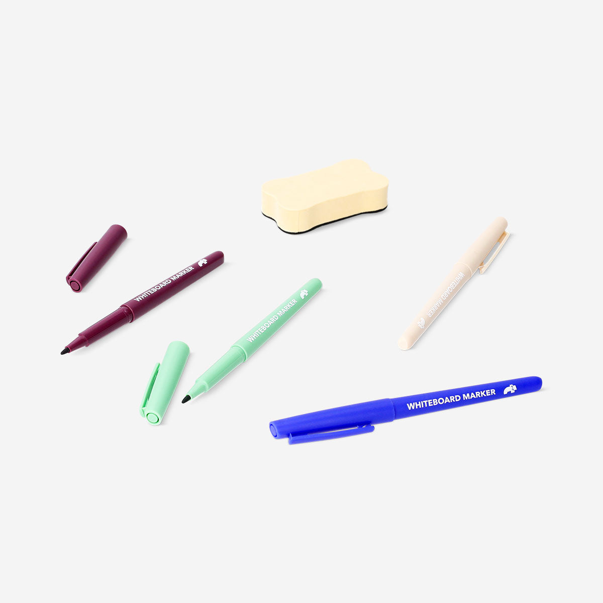 Set of four Flying Tiger Copenhagen whiteboard markers with fine tips, ideal for office presentations and writing.