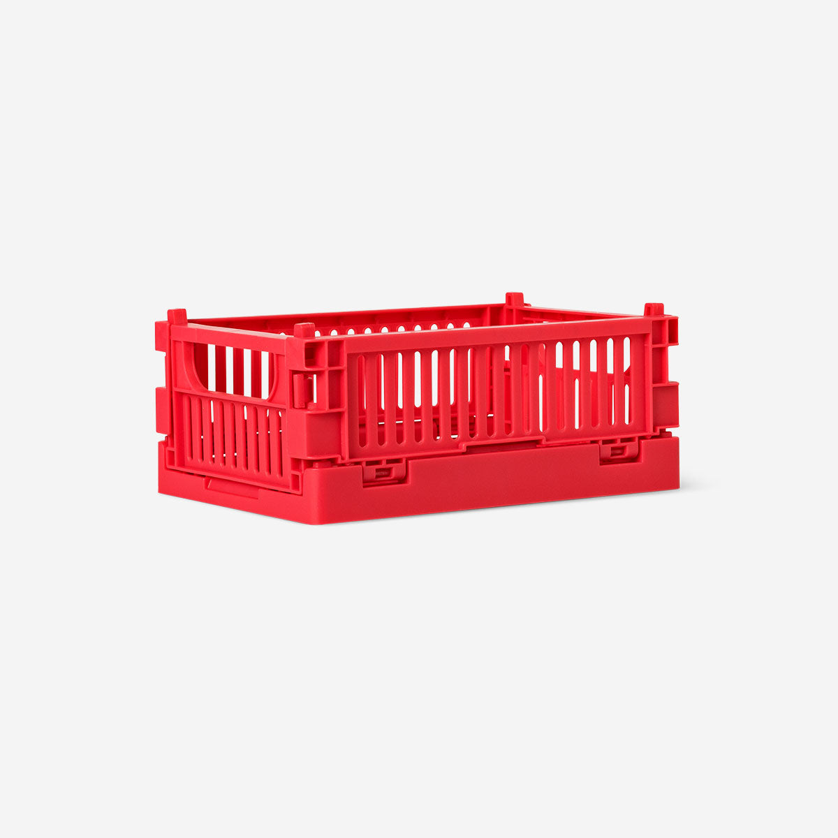 Red collapsible storage box for home organization by Flying Tiger Copenhagen, measuring 10x15 cm, shown folded and expanded.