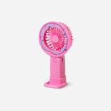 Pink doughnut-shaped handheld fan gadget by Flying Tiger Copenhagen, compact and portable for personal cooling.