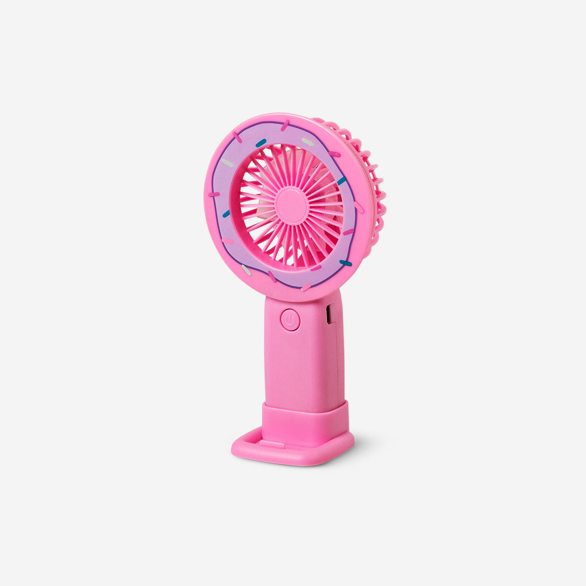 Pink doughnut-shaped handheld fan gadget by Flying Tiger Copenhagen, compact and portable for personal cooling.