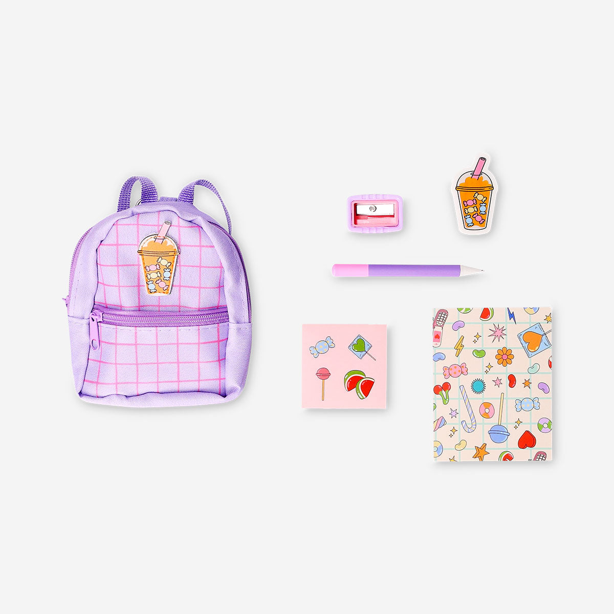 Candy-themed mini backpack stationery kit from Flying Tiger Copenhagen, featuring colorful office supplies and fun candy designs.