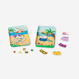 Magnetic dress-up game book by Flying Tiger Copenhagen with colorful magnetic outfits and accessories on a white background.