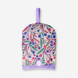 Colorful textile foldable fan with multi-colored flower patterns, designed by Flying Tiger Copenhagen for convenient cooling.