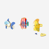 Three DIY cardboard fish craft kits by Flying Tiger Copenhagen, featuring colorful and textured fish for hobby and creative projects.