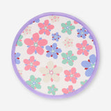 Foldable textile fan with abstract flower design by Flying Tiger Copenhagen displayed open with colorful floral pattern.