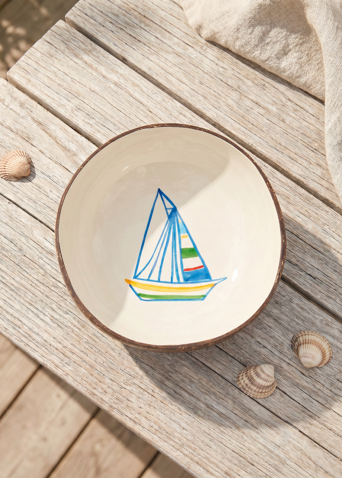 Hand-painted coconut bowl with boat motif, 13 cm, perfect for home decor, by Flying Tiger Copenhagen.