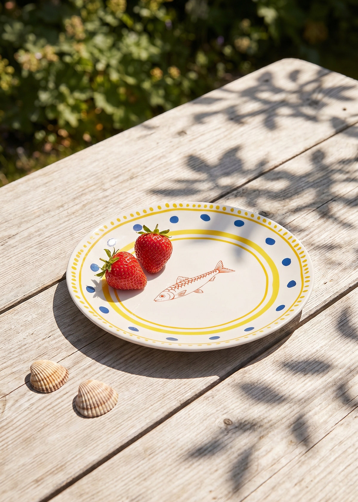 Ceramic kitchen plate with colorful dots and fish design, 16 cm, from Flying Tiger Copenhagen, featuring a vibrant pattern.
