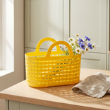 Yellow home storage basket with handles, 23x30 cm, by Flying Tiger Copenhagen, shown with handles and woven texture.