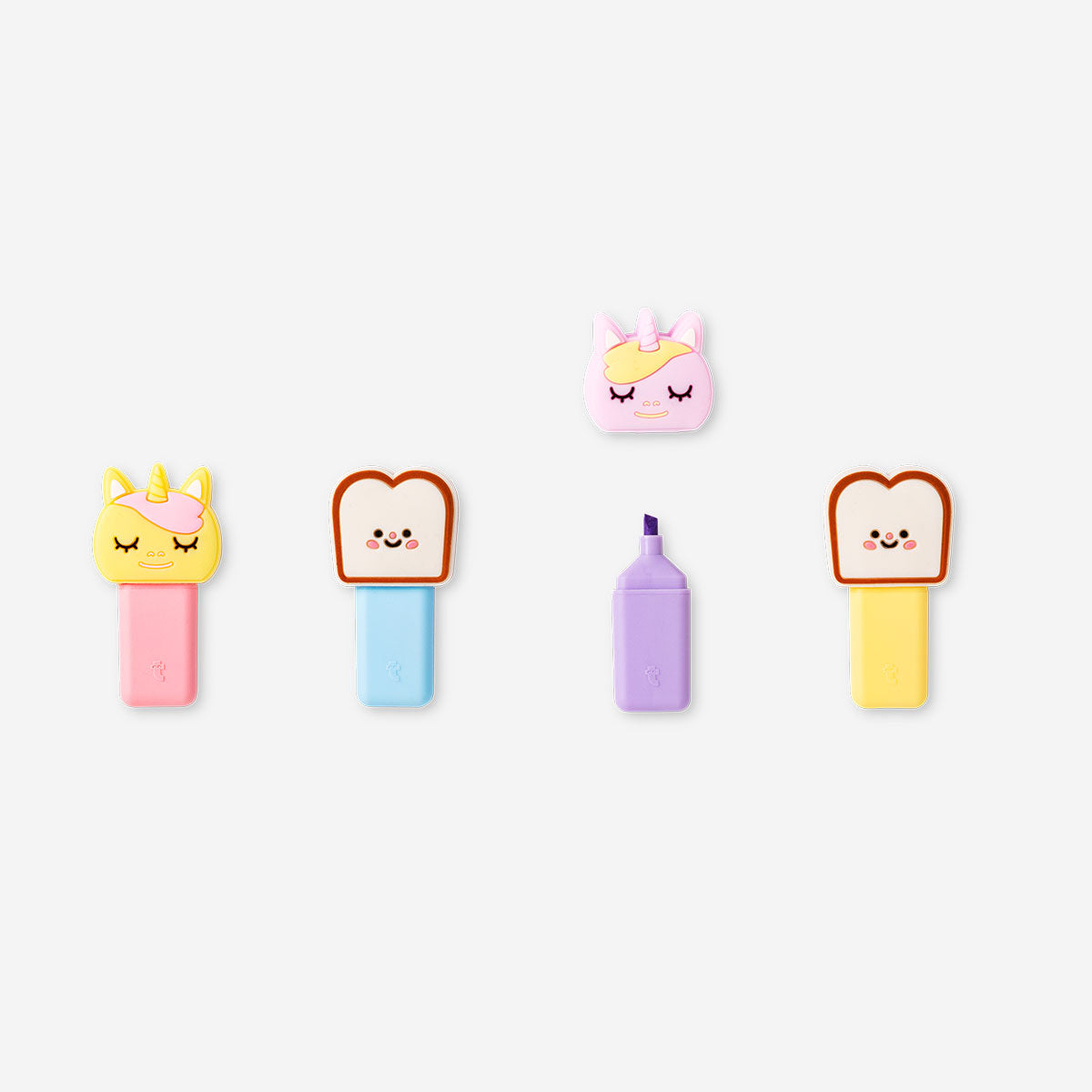 Set of four Unicorn and toast-themed highlighters by Flying Tiger Copenhagen, colorful office stationery for highlighting notes.