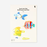 Set of three DIY cardboard fish craft kits from Flying Tiger Copenhagen for hobby and creative projects.