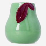 Pear-shaped toothbrush holder by Flying Tiger Copenhagen for home bathroom organization, made of durable plastic.