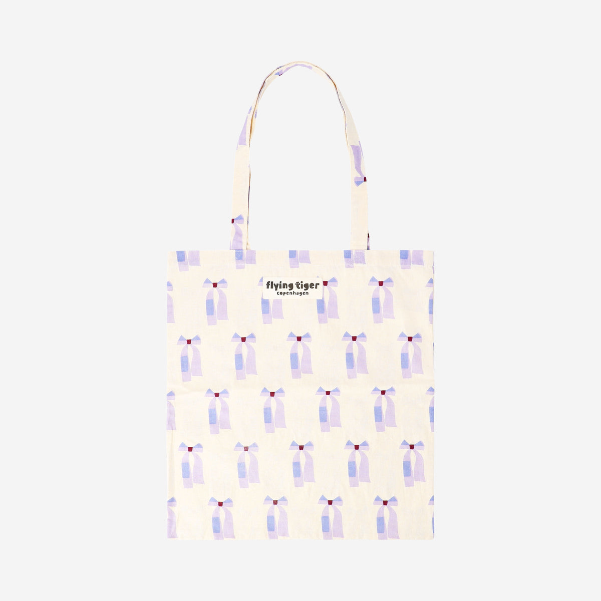 Purple bows textile tote bag with handles from Flying Tiger Copenhagen, featuring a stylish and functional design.