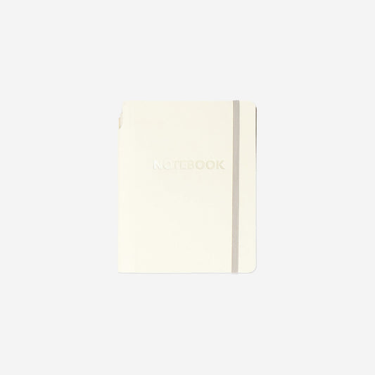Beige notebook with ballpoint pen