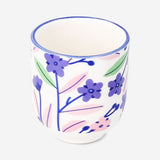 Colorful ceramic egg cup with floral design, 5 cm, from Flying Tiger Copenhagen, ideal for serving soft-boiled eggs in the kitchen.