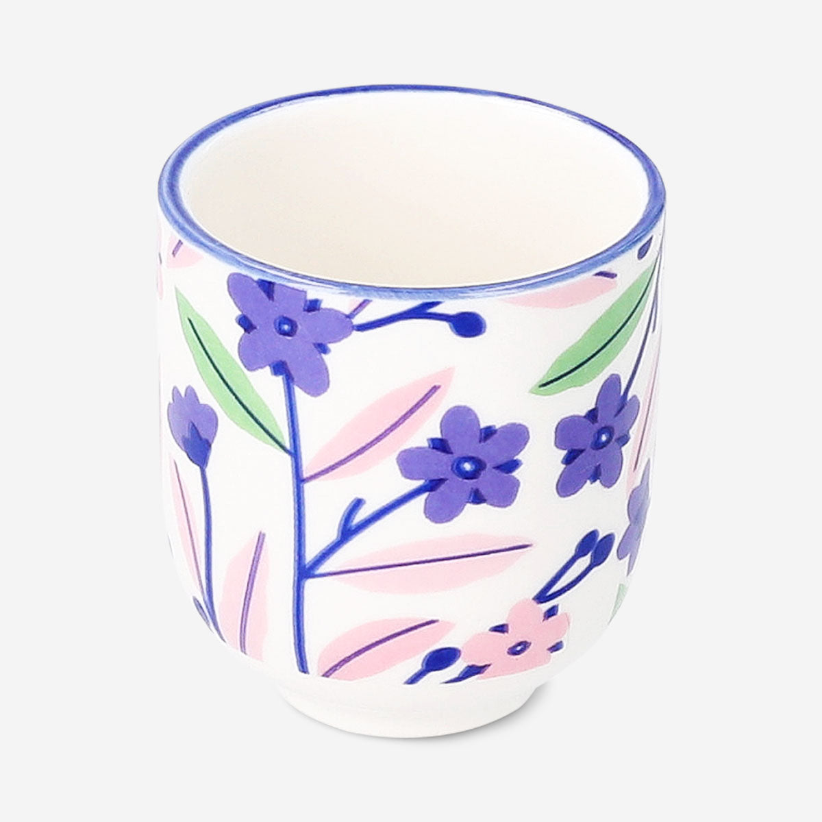 Colorful ceramic egg cup with floral design, 5 cm, from Flying Tiger Copenhagen, ideal for serving soft-boiled eggs in the kitchen.