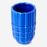 Blue ceramic seashell toothbrush holder from Flying Tiger Copenhagen, designed for bathroom organization and decor.
