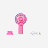 Pink doughnut-shaped handheld fan gadget by Flying Tiger Copenhagen, featuring a cute and portable design.