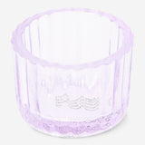 Purple glass tealight holder for home decor by Flying Tiger Copenhagen, featuring a smooth, rounded design and transparent finish.