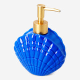 Blue ceramic seashell soap dispenser for home use, featuring a marine-inspired design by Flying Tiger Copenhagen.