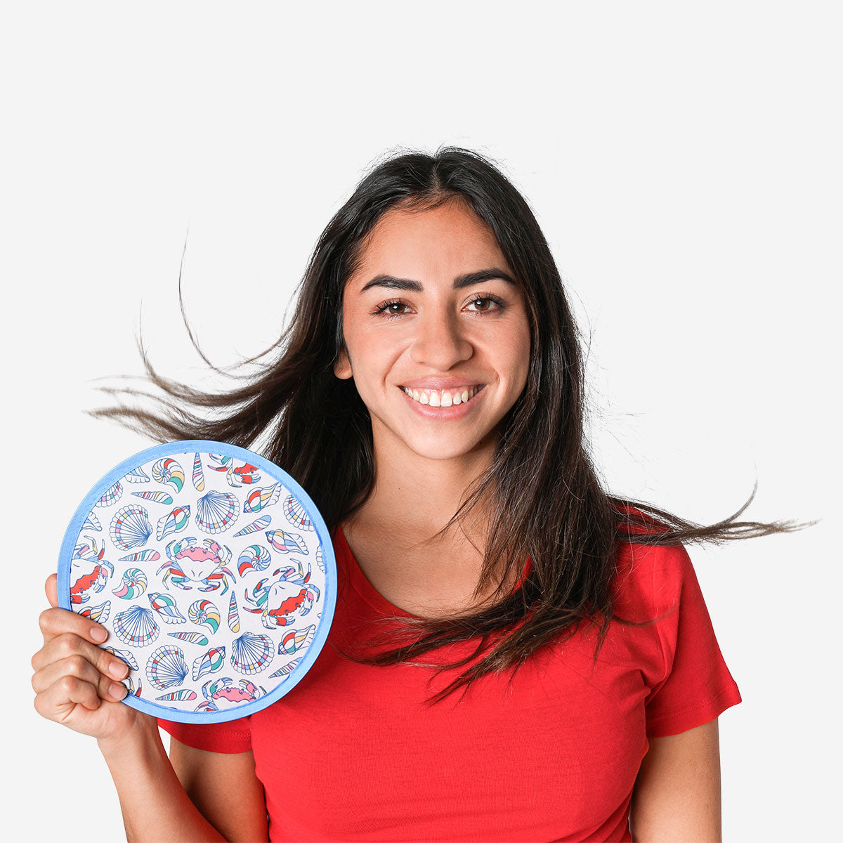 Foldable sea-themed textile fan by Flying Tiger Copenhagen, featuring a colorful ocean-inspired design and lightweight, portable construction.