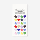 Flying Tiger Copenhagen star and heart stickers for office decor, featuring colorful designs on a white background.