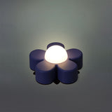 Purple flower-shaped Cosy lamp from Flying Tiger Copenhagen, featuring a soft, cozy home lighting design with floral details.
