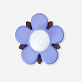 Purple flower-shaped cozy lamp from Flying Tiger Copenhagen, perfect for home decor with soft, ambient lighting.