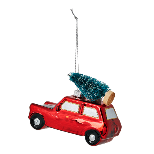 Christmas bauble. Car with christmas tree